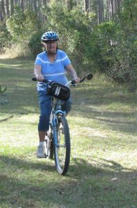 Peggy Biking Grassy Roads