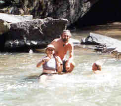 Judi & Chuck cool off by the waterfall